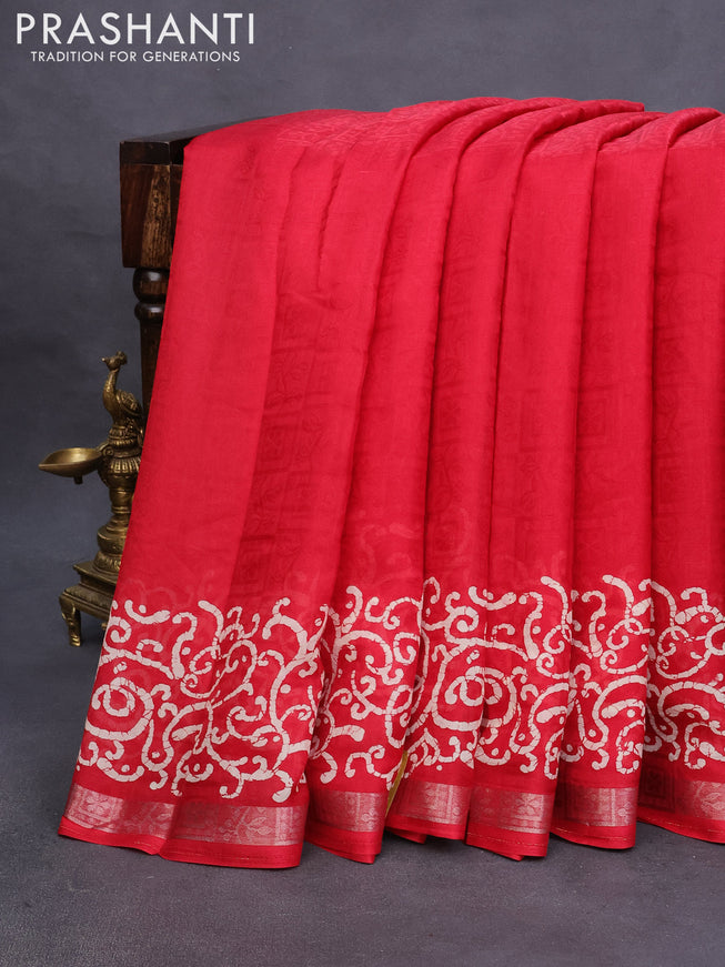 Semi crepe saree red with allover self emboss and batik printed border