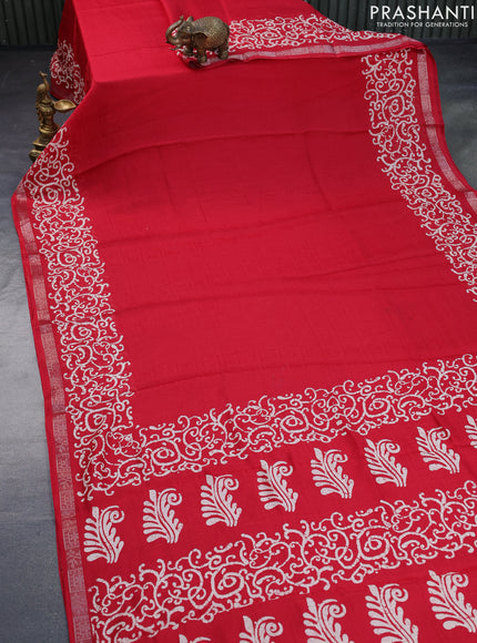 Semi crepe saree red with allover self emboss and batik printed border