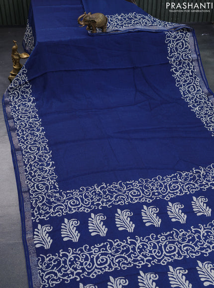 Semi crepe saree peacock blue with allover self emboss and batik printed border