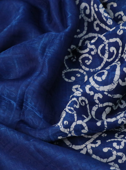 Semi crepe saree peacock blue with allover self emboss and batik printed border