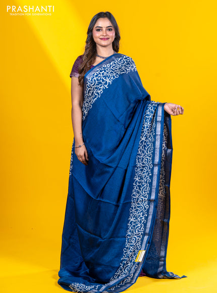 Semi crepe saree peacock blue with allover self emboss and batik printed border