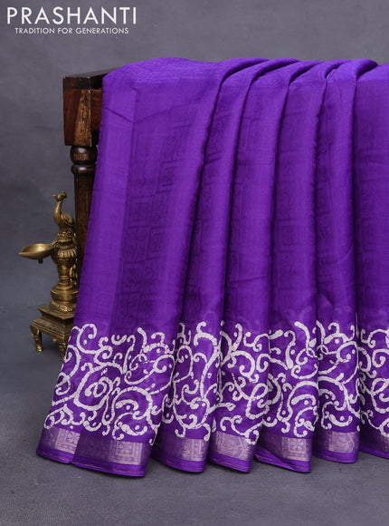 Semi crepe saree violet with allover self emboss and batik printed border