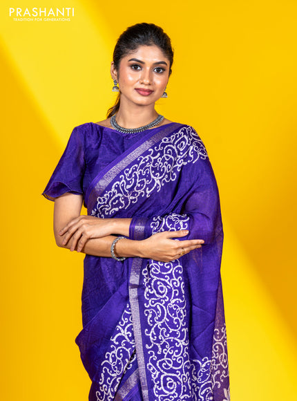 Semi crepe saree violet with allover self emboss and batik printed border