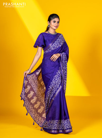 Semi crepe saree violet with allover self emboss and batik printed border