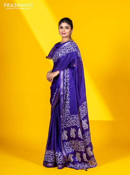 Semi crepe saree violet with allover self emboss and batik printed border