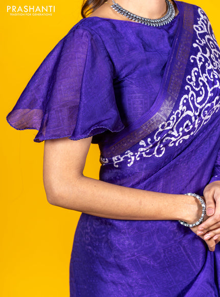 Semi crepe saree violet with allover self emboss and batik printed border