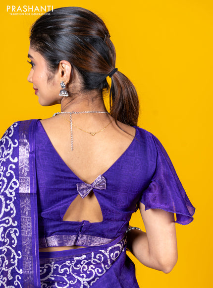 Semi crepe saree violet with allover self emboss and batik printed border