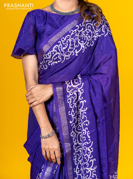 Semi crepe saree violet with allover self emboss and batik printed border