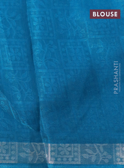 Semi crepe saree teal blue with allover self emboss and batik printed border