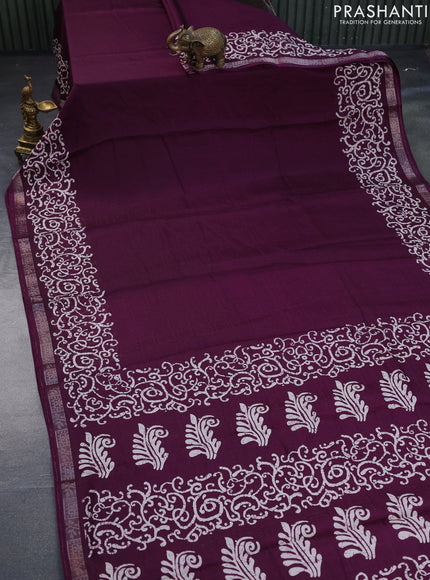 Semi crepe saree wine shade with allover self emboss and batik printed border