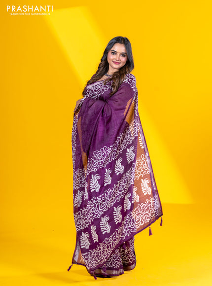 Semi crepe saree wine shade with allover self emboss and batik printed border