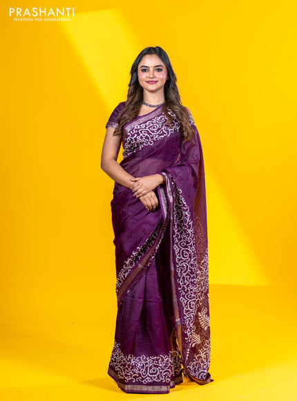 Semi crepe saree wine shade with allover self emboss and batik printed border