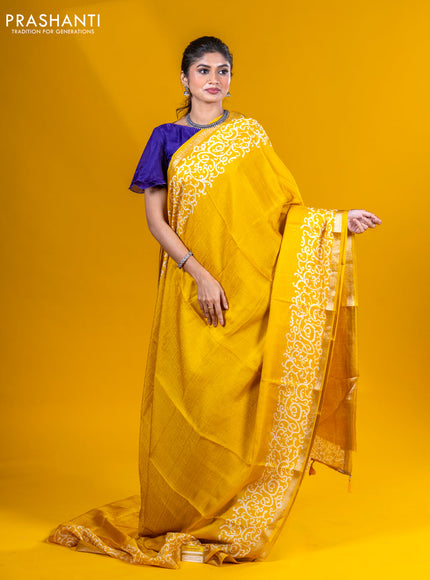 Semi crepe saree yellow with allover self emboss and batik printed border