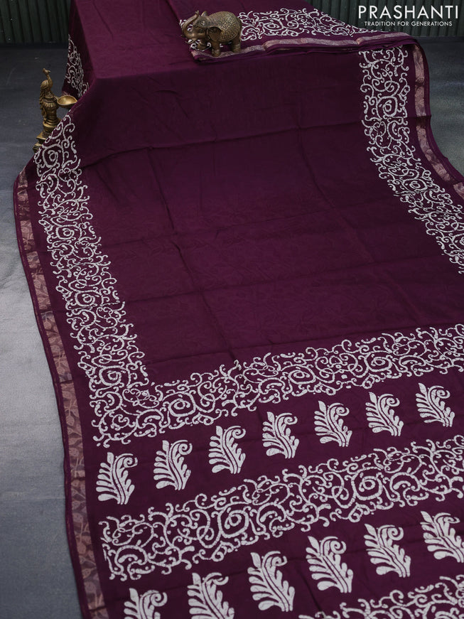 Semi crepe saree wine shade with allover self emboss and batik printed border