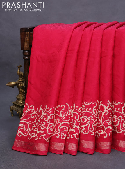 Semi crepe saree tomato pink with allover self emboss and batik printed border