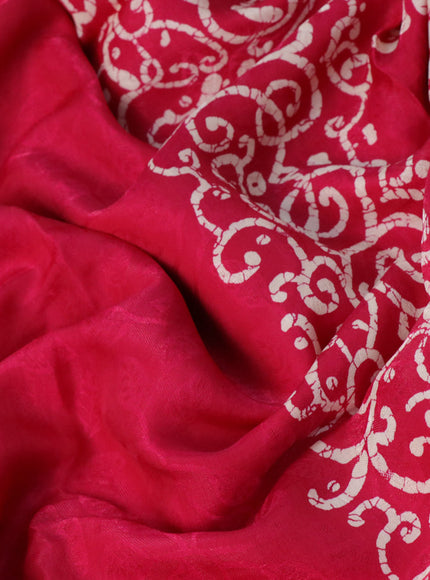 Semi crepe saree tomato pink with allover self emboss and batik printed border