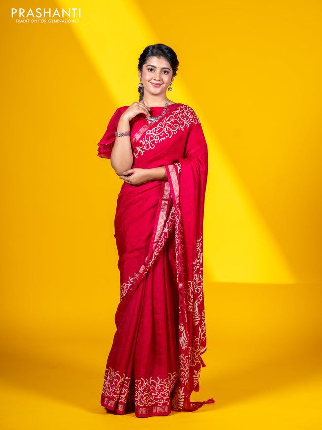 Semi crepe saree tomato pink with allover self emboss and batik printed border