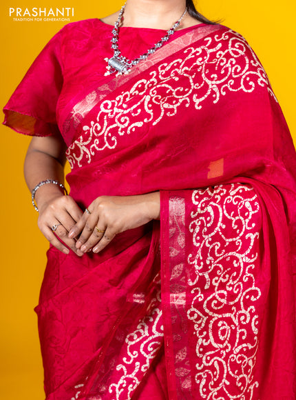 Semi crepe saree tomato pink with allover self emboss and batik printed border