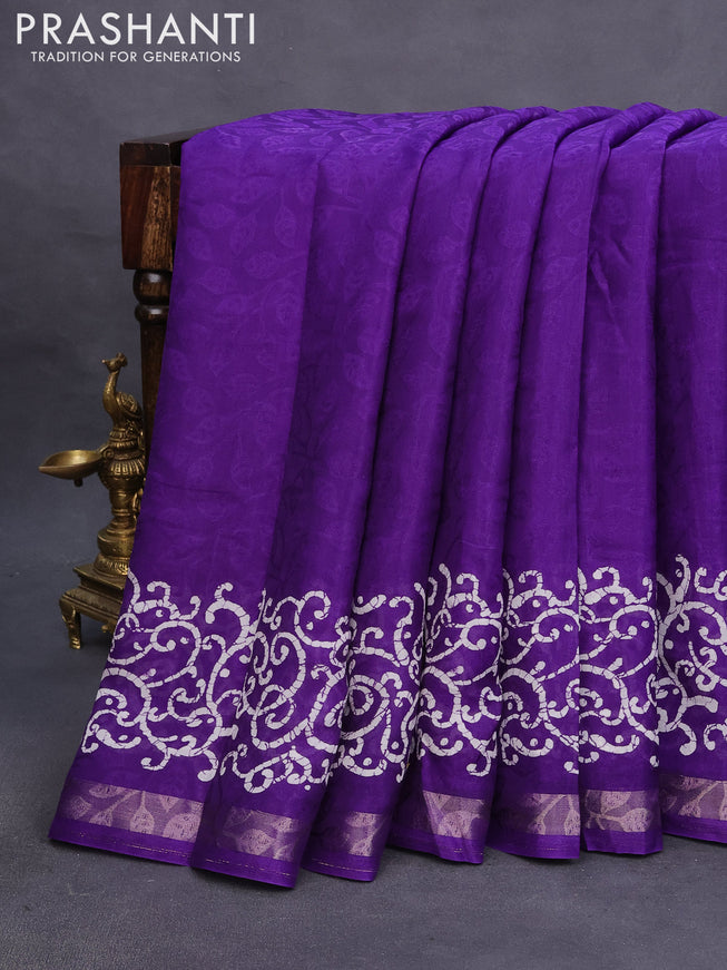 Semi crepe saree violet with allover self emboss and batik printed border