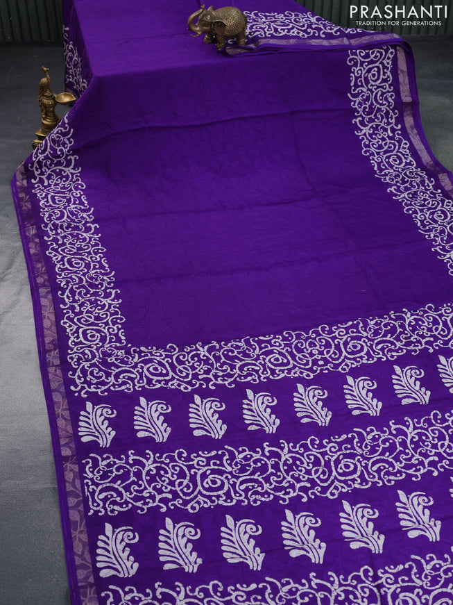 Semi crepe saree violet with allover self emboss and batik printed border