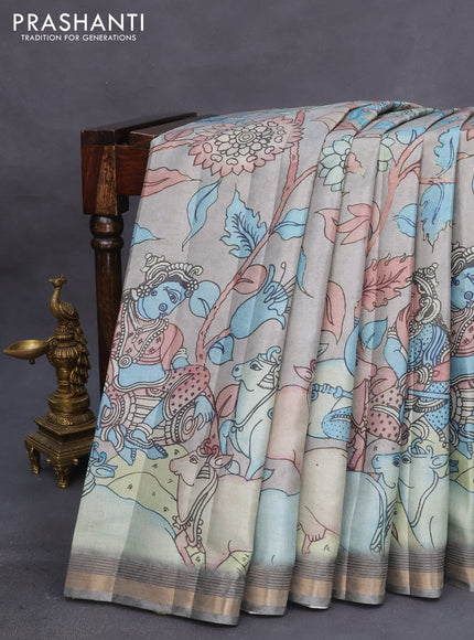 Semi tussar saree pastel grey shade with allover pen kalamkari prints and zari woven border