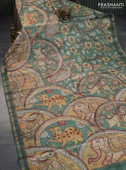 Semi tussar saree green with allover pen kalamkari prints and zari woven border