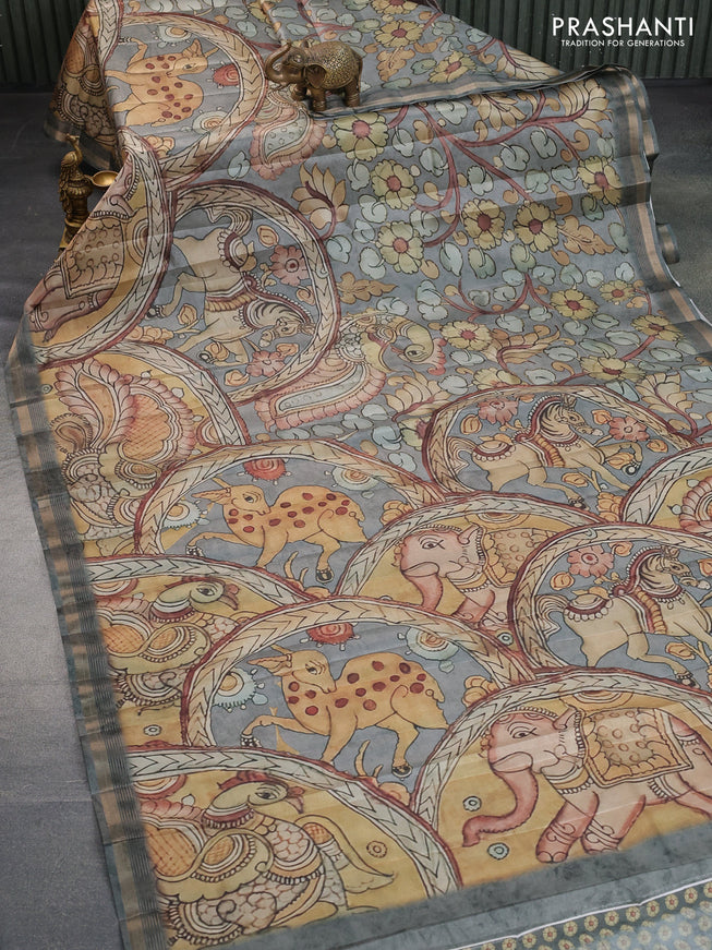 Semi tussar saree grey shade with allover pen kalamkari prints and zari woven border