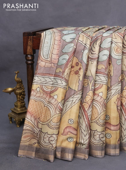 Semi tussar saree pastel brown with allover pen kalamkari prints and zari woven border