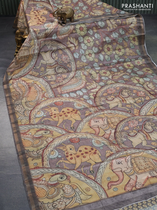 Semi tussar saree pastel brown with allover pen kalamkari prints and zari woven border