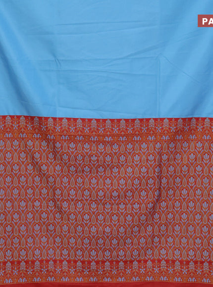 Semi banarasi katan saree light blue and red with plain body and zari woven border