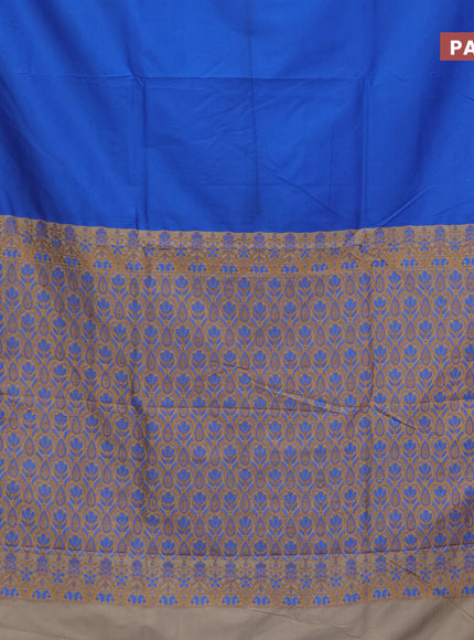 Semi banarasi katan saree cs blue and beige with plain body and zari woven border