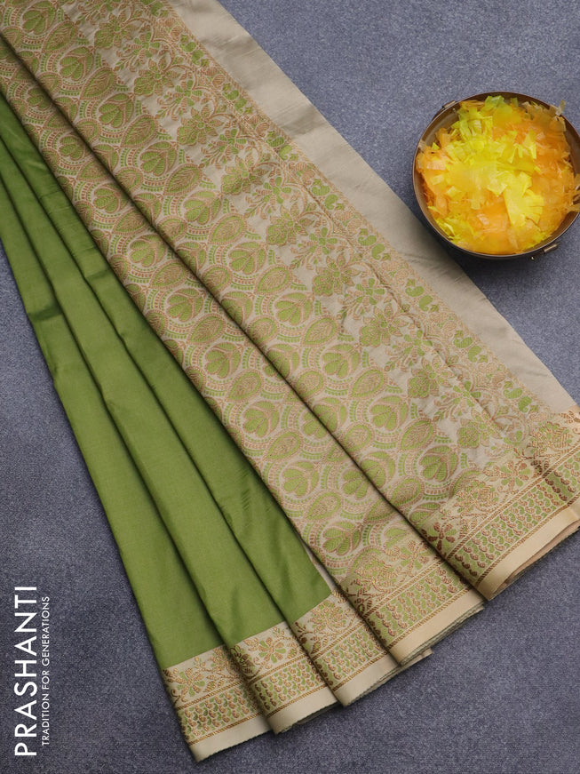 Semi banarasi katan saree mehendi green and beige with plain body and zari woven border