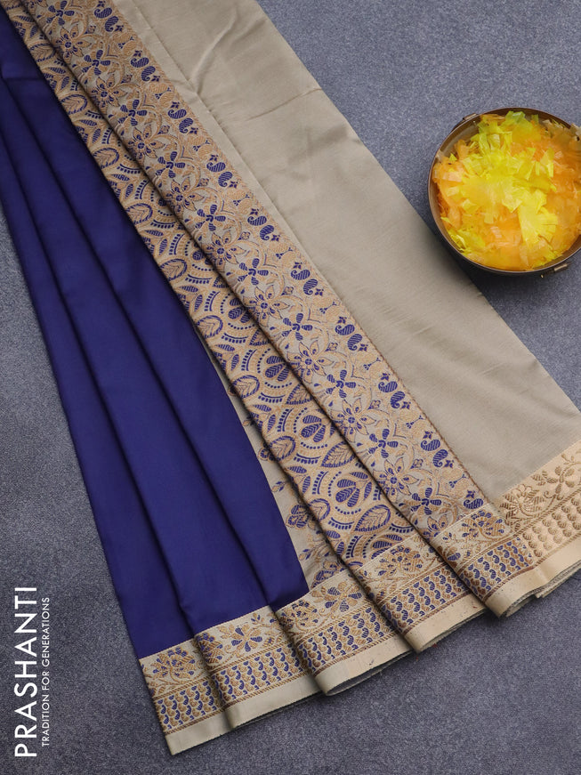 Semi banarasi katan saree navy blue and beige with plain body and zari woven border