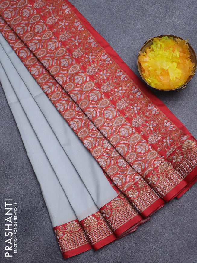 Semi banarasi katan saree pastel grey and red with plain body and zari woven border