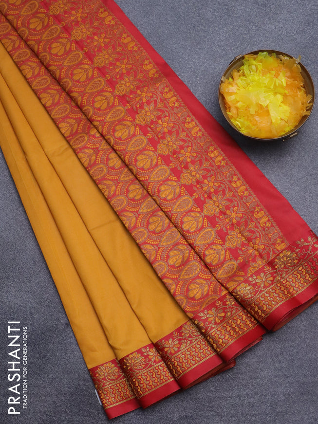 Semi banarasi katan saree mango yellow with plain body and zari woven border