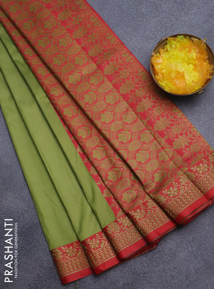 Semi banarasi katan saree mehendi green and red with plain body and zari woven border