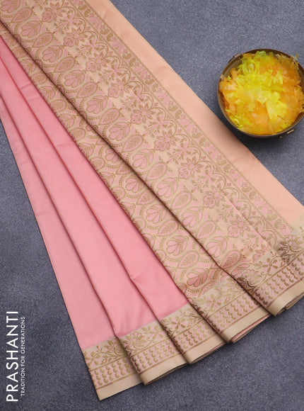 Semi banarasi katan saree mild peach and beige with plain body and zari woven border