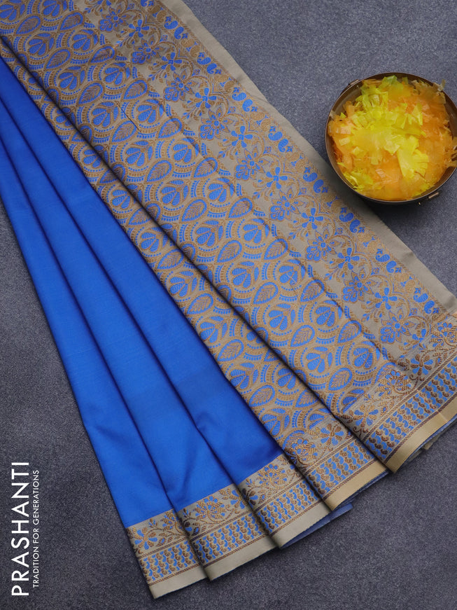 Semi banarasi katan saree cs blue and beige with plain body and zari woven border