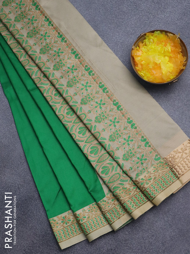 Semi banarasi katan saree green and sandal with plain body and zari woven border