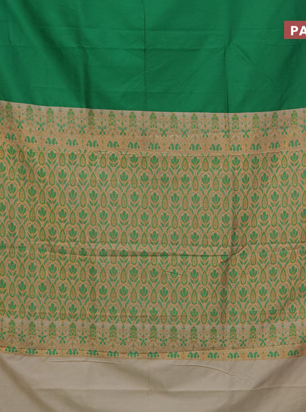 Semi banarasi katan saree green and sandal with plain body and zari woven border