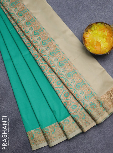 Semi banarasi katan saree teal green and sandal with plain body and thread & zari woven border