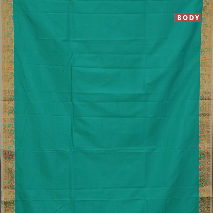 Semi banarasi katan saree teal green and sandal with plain body and thread & zari woven border