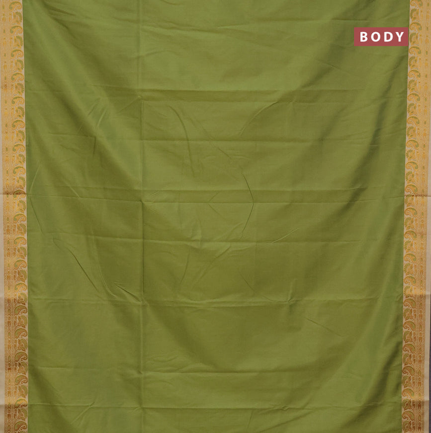 Semi banarasi katan saree mehendi green and cream with plain body and thread & zari woven border