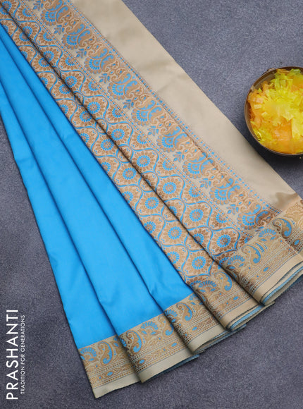 Semi banarasi katan saree light blue and cream with plain body and thread & zari woven border