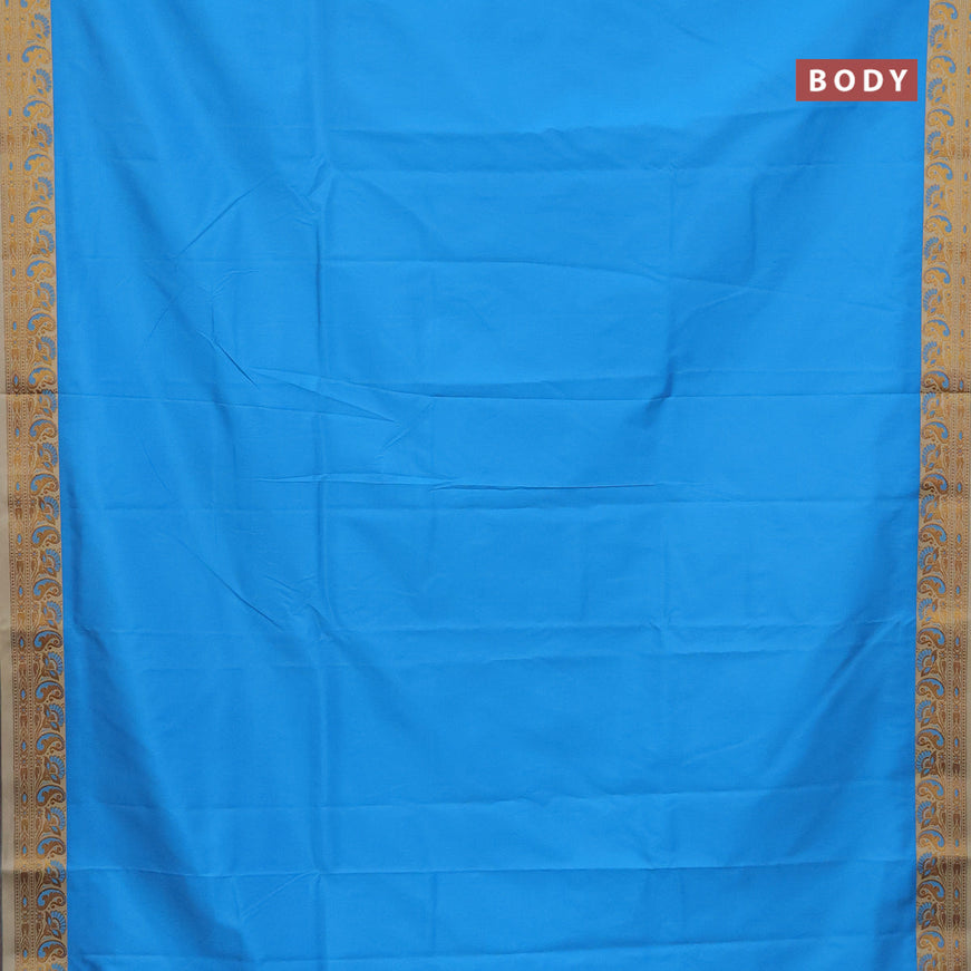 Semi banarasi katan saree light blue and cream with plain body and thread & zari woven border