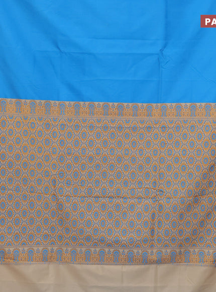 Semi banarasi katan saree light blue and cream with plain body and thread & zari woven border