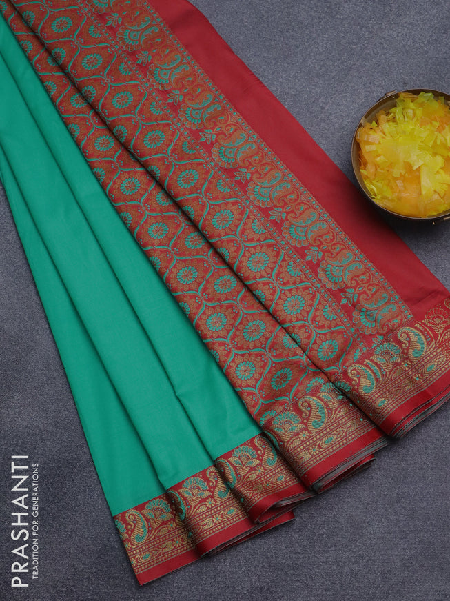 Semi banarasi katan saree teal green and red with plain body and thread & zari woven border