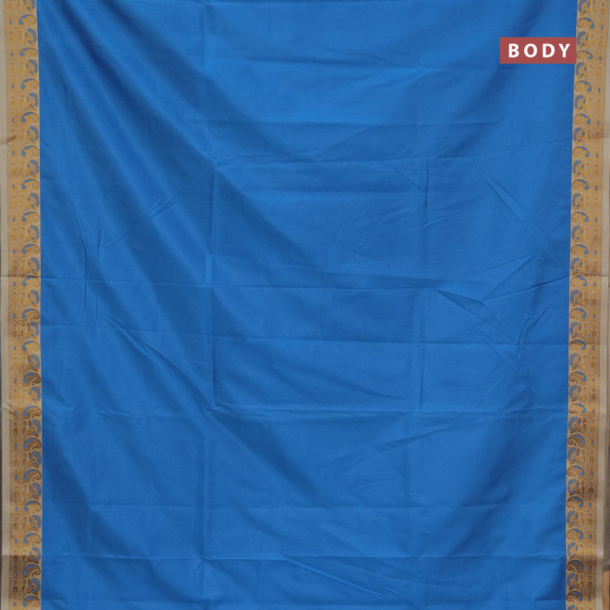 Semi banarasi katan saree cs blue and cream with plain body and thread & zari woven border