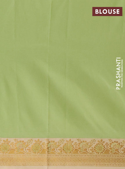 Semi banarasi katan saree pista green and sandal with plain body and zari woven border