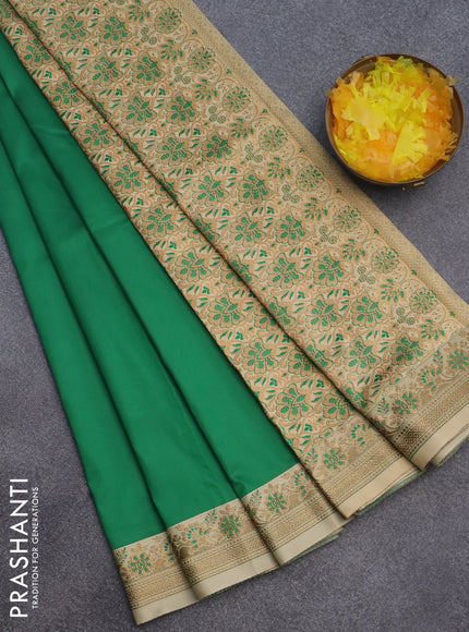 Semi banarasi katan saree green and sandal with plain body and zari woven border